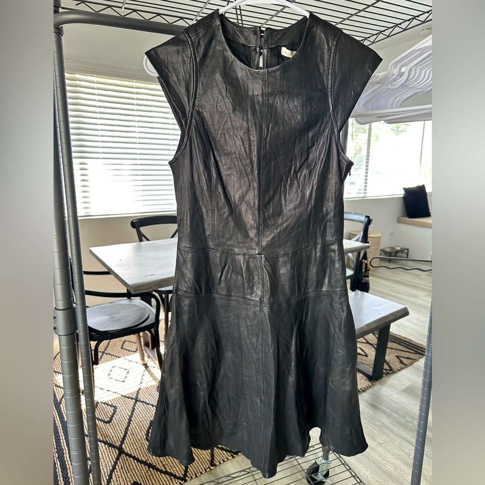 Vintage Burning Torch Black 100% genuine leather dress.